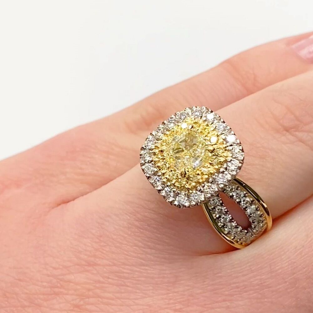 Cushion cut yellow diamond cluster ring