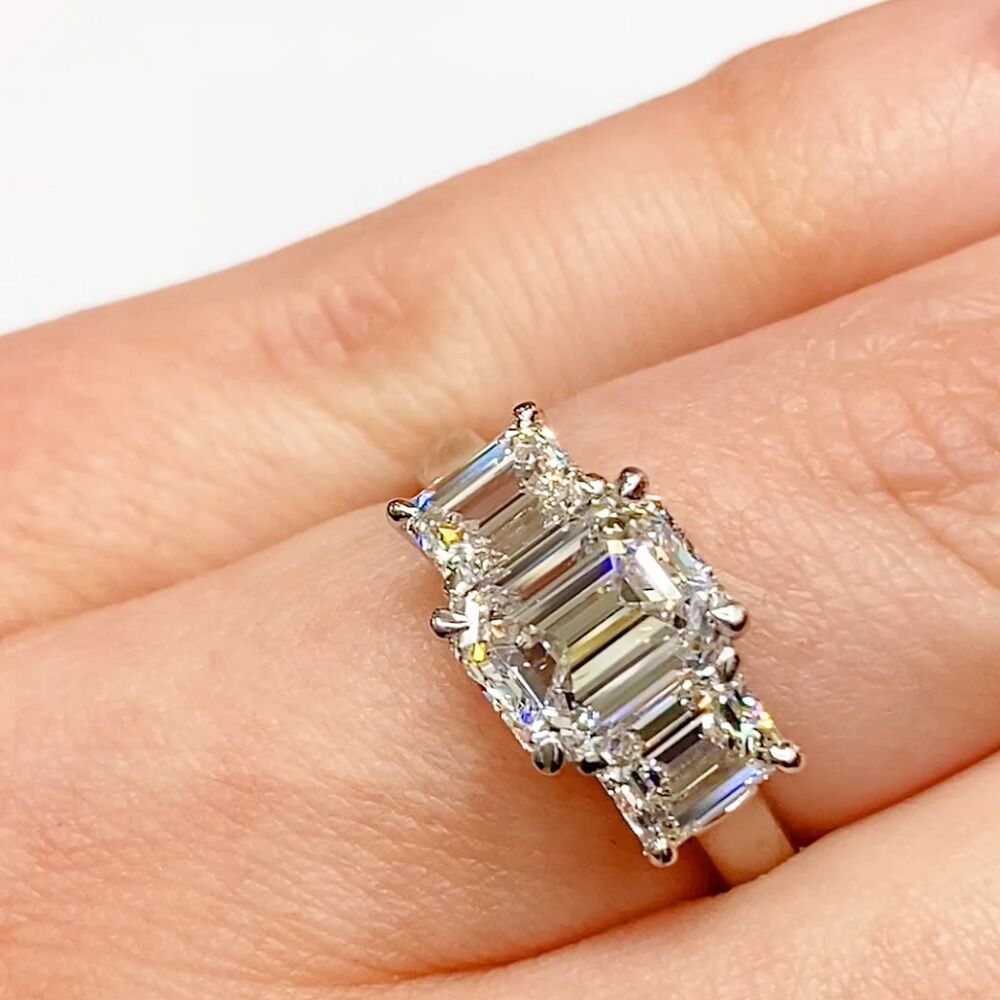 Emerald cut 3 across diamond ring