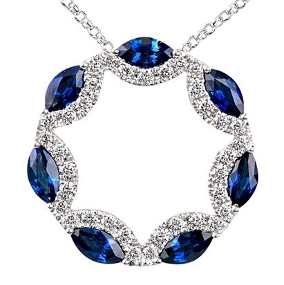 18k white gold baguette and round brilliant cut sapphires pendant close