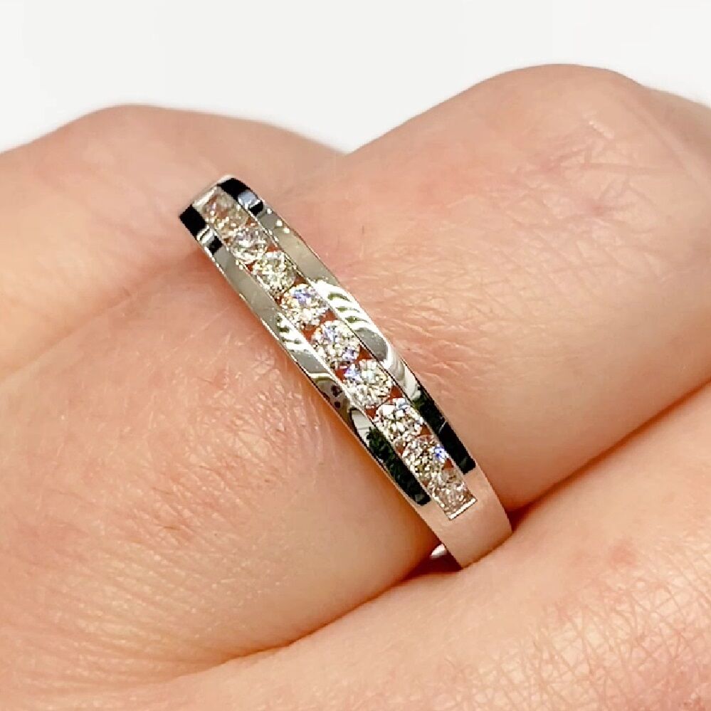 Channel set white gold diamond band